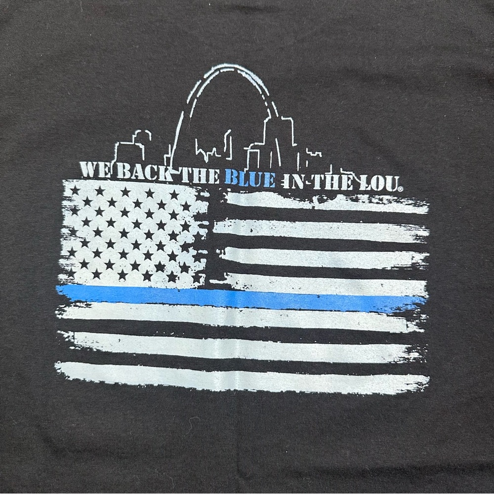 Black T-Shirt with Blue and White Flag “We Back The Blue In The Lou” Large